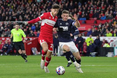 Matt Crooks #25 of Middlesbrough and Shaun Hutchinson #4 of Millwall tussle for the ball during the Sky Bet Championship match Middlesbrough vs Millwall at Riverside Stadium, Middlesbrough, United Kingdom, 14th January 202