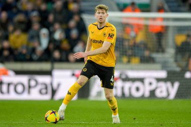 Nathan Collins #4 of Wolverhampton Wanderers with the ball during the Premier League match Wolverhampton Wanderers vs West Ham United at Molineux, Wolverhampton, United Kingdom, 14th January 202