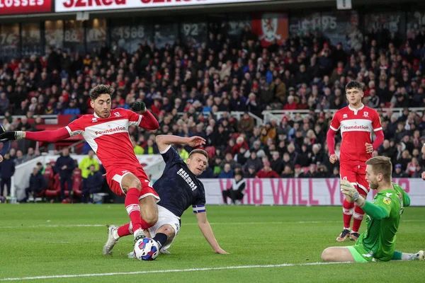 Shaun Hutchinson #4 of Millwall puts in a last ditch challenge on Matt Crooks #25 of Middlesbrough during the Sky Bet Championship match Middlesbrough vs Millwall at Riverside Stadium, Middlesbrough, United Kingdom, 14th January 202