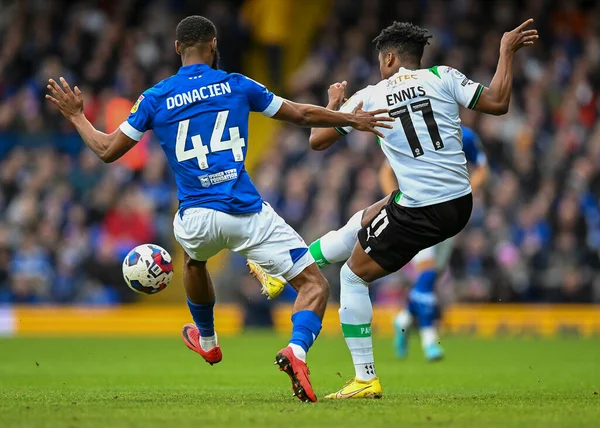 Plymouth Argyle forward Niall Ennis  (11) and Ipswich Town defender Janoi Donacien  (44) battles for the ball  during the Sky Bet League 1 match Ipswich Town vs Plymouth Argyle at Portman Road, Ipswich, United Kingdom, 14th January 202