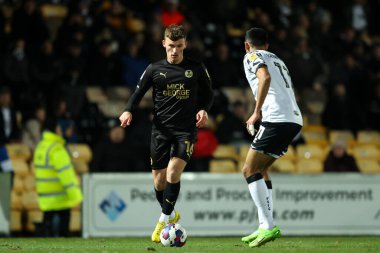 Harrison Burrows of Peterborough United is confronted by Malvind Benning of Port Vale during the Sky Bet League 1 match Port Vale vs Peterborough at Vale Park, Burslem, United Kingdom, 16th January 202