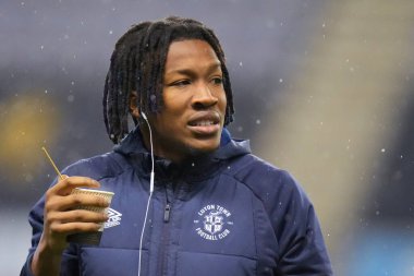 Gabriel Osho #32 of Luton Town inspects the pitch before the Emirates FA Cup match Third Round Replay Wigan Athletic vs Luton Town at DW Stadium, Wigan, United Kingdom, 17th January 202