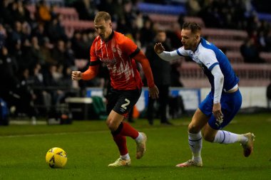 James Bree #2 of Luton Town breaks past Tom Naylor #4 of Wigan Athletic during the Emirates FA Cup match Third Round Replay Wigan Athletic vs Luton Town at DW Stadium, Wigan, United Kingdom, 17th January 202