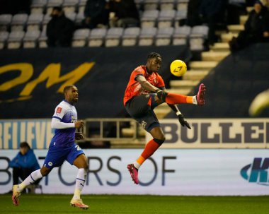 Elijah Adebayo #11 of Luton Town watches the ball during the Emirates FA Cup match Third Round Replay Wigan Athletic vs Luton Town at DW Stadium, Wigan, United Kingdom, 17th January 202