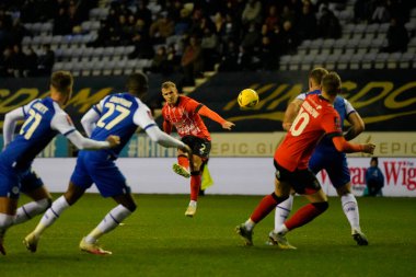 James Bree #2 of Luton Town drives a free kick at the Wigan Athletic  goal during the Emirates FA Cup match Third Round Replay Wigan Athletic vs Luton Town at DW Stadium, Wigan, United Kingdom, 17th January 202