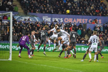 Nathan Wood #23 of Swansea City wins the high ball during the Emirates FA Cup Third Round Replay match Swansea City vs Bristol City at Swansea.com Stadium, Swansea, United Kingdom, 17th January 202
