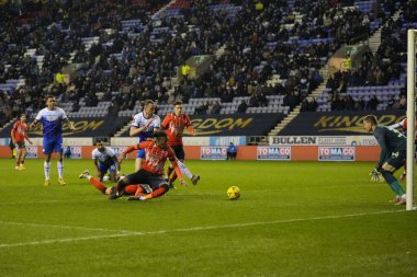 Will Keane #10 of Wigan Athletic shoots in the Luton Town penalty box during the Emirates FA Cup match Third Round Replay Wigan Athletic vs Luton Town at DW Stadium, Wigan, United Kingdom, 17th January 202