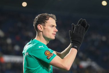 Liam Mandeville #7 of Chesterfield applauds the travelling fans ahead of the Emirates FA Cup Third Round Replay match West Bromwich Albion vs Chesterfield at The Hawthorns, West Bromwich, United Kingdom, 17th January 202