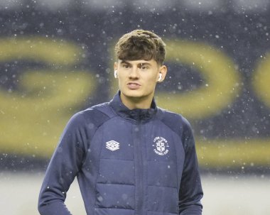 Elliot Thorpe #28 of Luton Town inspects the pitch before the Emirates FA Cup match Third Round Replay Wigan Athletic vs Luton Town at DW Stadium, Wigan, United Kingdom, 17th January 202