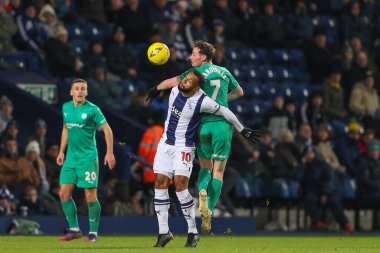 Matt Phillips #10 of West Bromwich Albion and Liam Mandeville #7 of Chesterfield battle for the ball during the Emirates FA Cup Third Round Replay match West Bromwich Albion vs Chesterfield at The Hawthorns, West Bromwich, United Kingdom, 17th Januar