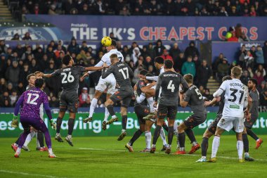 Nathan Wood #23 of Swansea City wins the high ball during the Emirates FA Cup Third Round Replay match Swansea City vs Bristol City at Swansea.com Stadium, Swansea, United Kingdom, 17th January 202