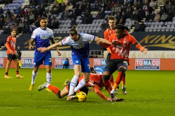 Will Keane #10 of Wigan Athletic battle for the ball in the Luton Town penalty box during the Emirates FA Cup match Third Round Replay Wigan Athletic vs Luton Town at DW Stadium, Wigan, United Kingdom, 17th January 202