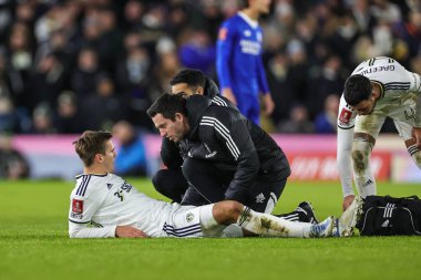 Max Wber #39 of Leeds United receives treatment during the Emirates FA Cup Third Round replay Leeds United vs Cardiff City at Elland Road, Leeds, United Kingdom, 18th January 2023