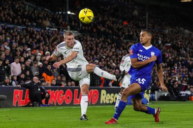 Rasmus Kristensen #25 of Leeds United crosses the ball is blocked by Andy Rinomhota #35 of Cardiff City during the Emirates FA Cup Third Round replay Leeds United vs Cardiff City at Elland Road, Leeds, United Kingdom, 18th January 202
