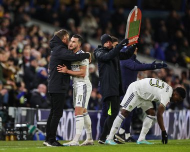 Jesse Marsch manager of Leeds United embraces Jack Harrison #11 as he leaves the field during the Emirates FA Cup Third Round replay Leeds United vs Cardiff City at Elland Road, Leeds, United Kingdom, 18th January 202