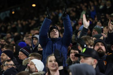 Leeds fans applaud the team as they take the field ahead of  the Emirates FA Cup Third Round replay Leeds United vs Cardiff City at Elland Road, Leeds, United Kingdom, 18th January 202