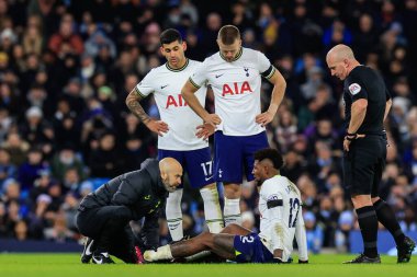 Emerson #12 of Tottenham Hotspur receives treatment during the Premier League match Manchester City vs Tottenham Hotspur at Etihad Stadium, Manchester, United Kingdom, 19th January 202
