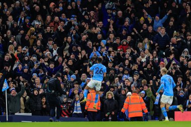 Riyad Mahrez #26 of Manchester City celebrates his goal to make it 4-2 with the fans during the Premier League match Manchester City vs Tottenham Hotspur at Etihad Stadium, Manchester, United Kingdom, 19th January 202