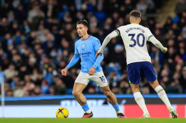 Jack Grealish #10 of Manchester City with the ball as Rodrigo Bentancur #30 of Tottenham Hotspur pressures during the Premier League match Manchester City vs Tottenham Hotspur at Etihad Stadium, Manchester, United Kingdom, 19th January 202
