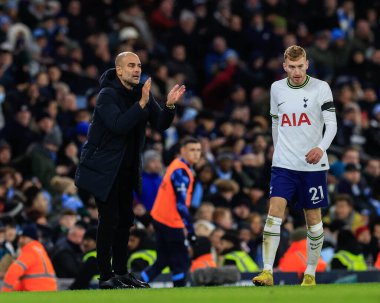 Pep Guardiola manager of Manchester City applauds his players during the Premier League match Manchester City vs Tottenham Hotspur at Etihad Stadium, Manchester, United Kingdom, 19th January 202