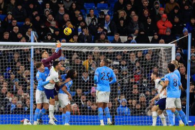 Ederson #31 of Manchester City punches the ball out during the Premier League match Manchester City vs Tottenham Hotspur at Etihad Stadium, Manchester, United Kingdom, 19th January 202