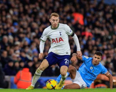 Dejan Kulusevski #21 of Tottenham Hotspur skips past Rodri #16 of Manchester City during the Premier League match Manchester City vs Tottenham Hotspur at Etihad Stadium, Manchester, United Kingdom, 19th January 202