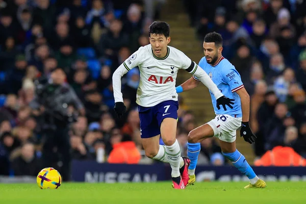 stock image Son Heung-Min #7 of Tottenham Hotspur goes past Riyad Mahrez #26 of Manchester City during the Premier League match Manchester City vs Tottenham Hotspur at Etihad Stadium, Manchester, United Kingdom, 19th January 202