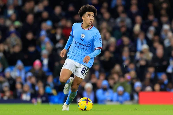 Rico Lewis #82 of Manchester City in action during the Premier League match Manchester City vs Tottenham Hotspur at Etihad Stadium, Manchester, United Kingdom, 19th January 202