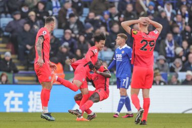 Kaoru Mitoma of Brighton & Hove Albion barges into Moiss Caicedo of Brighton & Hove Albion as he celebrates his goal injuring Caicedo during the Premier League match Leicester City vs Brighton and Hove Albion at King Power Stadium, Leicester, UK