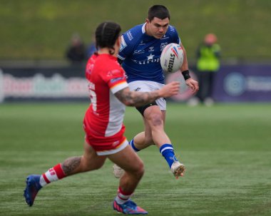 Jake Clifford #7 of Hull FC kicks through during the Rugby League Pre Season match Sheffield Eagles vs Hull FC at Sheffield Olympic Legacy Park, Sheffield, United Kingdom, 22nd January 202
