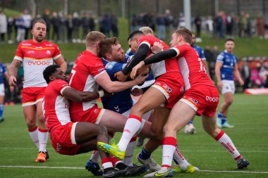 Scott Taylor #30 of Hull FC is held by Sheffield Eagles  defenders during the Rugby League Pre Season match Sheffield Eagles vs Hull FC at Sheffield Olympic Legacy Park, Sheffield, United Kingdom, 22nd January 202