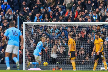 Erling Hland #9 of Manchester City celebrates his goal to make it 3-0 during the Premier League match Manchester City vs Wolverhampton Wanderers at Etihad Stadium, Manchester, United Kingdom, 22nd January 2023