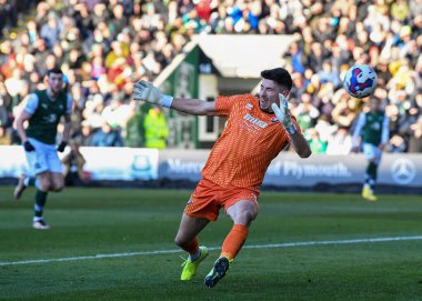 GOAL Cheltenham Town goalkeeper Luke Southwood  (1) cant stop the ball hitting back of the net from Plymouth Argyle defender Dan Scarr  (6) shot during the Sky Bet League 1 match Plymouth Argyle vs Cheltenham Town at Home Park, Plymouth, UK