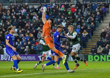 Cheltenham Town goalkeeper Luke Southwood  (1) makes a save  during the Sky Bet League 1 match Plymouth Argyle vs Cheltenham Town at Home Park, Plymouth, United Kingdom, 21st January 202