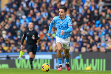 Jack Grealish #10 of Manchester City runs with the ball during the Premier League match Manchester City vs Wolverhampton Wanderers at Etihad Stadium, Manchester, United Kingdom, 22nd January 202