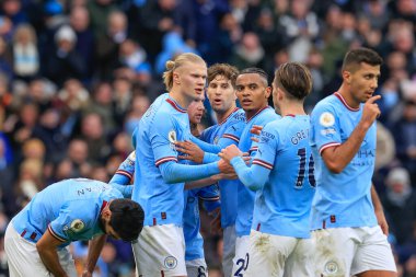 Erling Hland #9 of Manchester City celebrates his goal to make it 1-0 with teammates during the Premier League match Manchester City vs Wolverhampton Wanderers at Etihad Stadium, Manchester, United Kingdom, 22nd January 2023