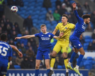 Mark McGuinness #5 of Cardiff City  and Jake Cooper #5 of Millwall challenge the high ballduring the Sky Bet Championship match Cardiff City vs Millwall at Cardiff City Stadium, Cardiff, United Kingdom, 21st January 202