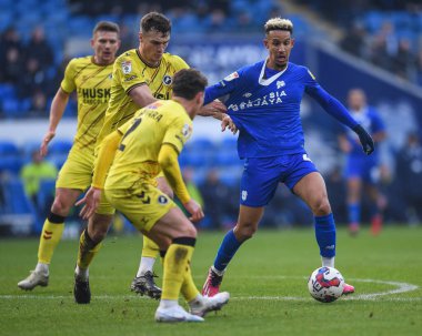 Callum Robinson #47 of Cardiff City being held back by Jake Cooper #5 of Millwall during the Sky Bet Championship match Cardiff City vs Millwall at Cardiff City Stadium, Cardiff, United Kingdom, 21st January 202