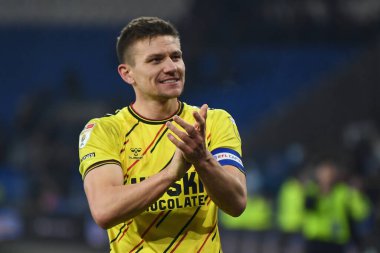 Shaun Hutchinson #4 of Millwall applauds the travelling supporters during the Sky Bet Championship match Cardiff City vs Millwall at Cardiff City Stadium, Cardiff, United Kingdom, 21st January 202