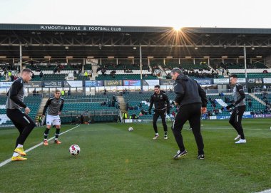 Plymouth Argyle warming up including Plymouth Argyle First team coach Kevin Nancekivell  during the Sky Bet League 1 match Plymouth Argyle vs Cheltenham Town at Home Park, Plymouth, United Kingdom, 21st January 202