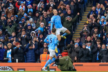 Erling Hland #9 of Manchester City celebrates his goal to make it 2-0 during the Premier League match Manchester City vs Wolverhampton Wanderers at Etihad Stadium, Manchester, United Kingdom, 22nd January 2023