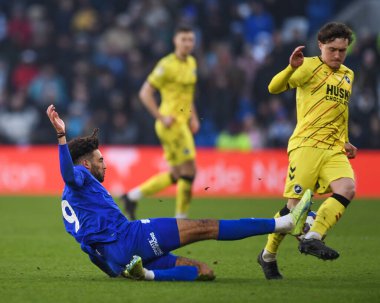 Callum Styles #17 of Millwall tackled by Kion Etete #9 of Cardiff City  during the Sky Bet Championship match Cardiff City vs Millwall at Cardiff City Stadium, Cardiff, United Kingdom, 21st January 202