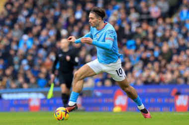 Jack Grealish #10 of Manchester City  runs with the ball during the Premier League match Manchester City vs Wolverhampton Wanderers at Etihad Stadium, Manchester, United Kingdom, 22nd January 202