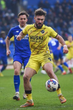 Tom Bradshaw #9 of Millwall under pressure from Ryan Wintle #6 of Cardiff City  during the Sky Bet Championship match Cardiff City vs Millwall at Cardiff City Stadium, Cardiff, United Kingdom, 21st January 202