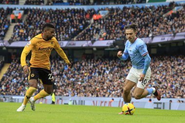 Jack Grealish #10 of Manchester City turns past Nelson Semedo #22 of Wolverhampton Wanderers during the Premier League match Manchester City vs Wolverhampton Wanderers at Etihad Stadium, Manchester, United Kingdom, 22nd January 202