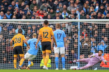 Erling Hland #9 of Manchester City scores a goal to make it 2-0 during the Premier League match Manchester City vs Wolverhampton Wanderers at Etihad Stadium, Manchester, United Kingdom, 22nd January 2023