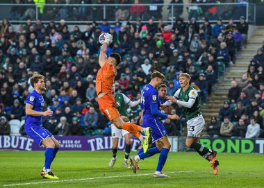 Cheltenham Town goalkeeper Luke Southwood  (1) makes a save  during the Sky Bet League 1 match Plymouth Argyle vs Cheltenham Town at Home Park, Plymouth, United Kingdom, 21st January 202