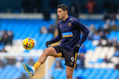 Ral Jimnez #9 of Wolverhampton Wanderers during the pre-game warm up ahead of the Premier League match Manchester City vs Wolverhampton Wanderers at Etihad Stadium, Manchester, United Kingdom, 22nd January 2023