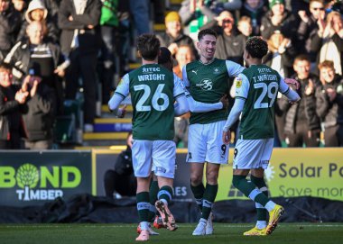 GOAL Plymouth Argyle forward Ryan Hardie  (9) celebrates a goal with Plymouth Argyle midfielder Callum Wright (26)  and Plymouth Argyle midfielder Tyreik Wright (29) to make it 2-0    during the Sky Bet League 1 match Plymouth Argyle vs Cheltenham To