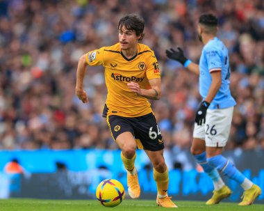 Hugo Bueno #64 of Wolverhampton Wanderers runs with the ball during the Premier League match Manchester City vs Wolverhampton Wanderers at Etihad Stadium, Manchester, United Kingdom, 22nd January 202